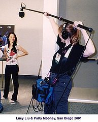 Sound Technician Patty Mooney booms Lucy Liu at SD Comic Con