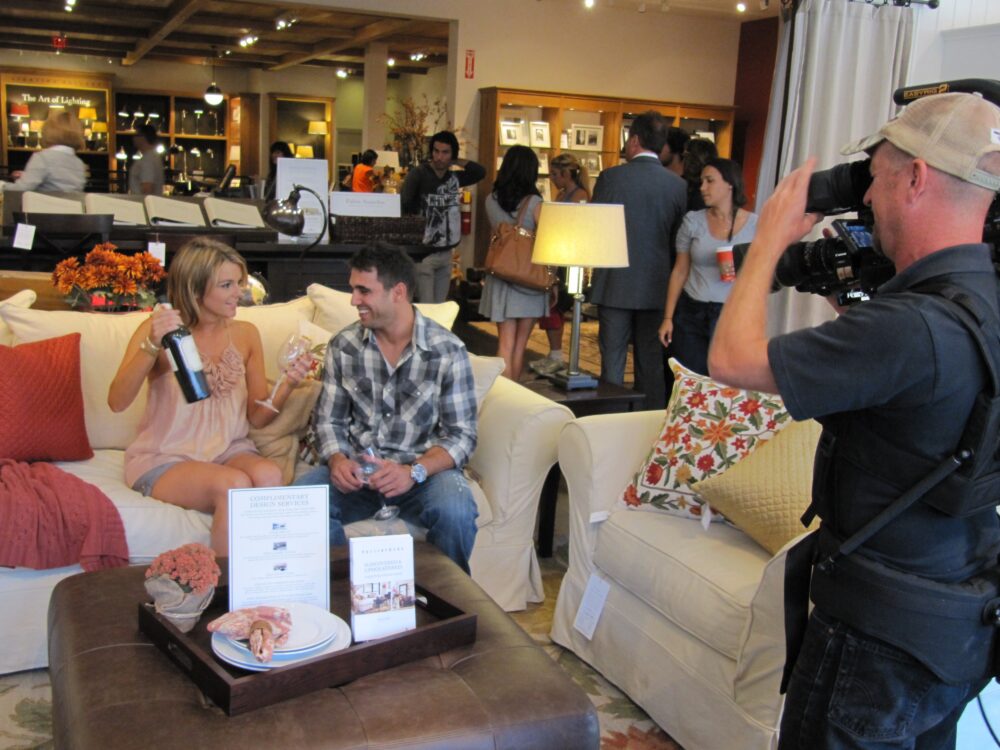 Ali Fedotowsky with Mark Schulze and Roberto Martinez on a broadcast shoot for Extra