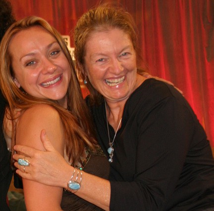 Actress Nicole Sullivan and San Diego video producer Patty Mooney give each other a hug