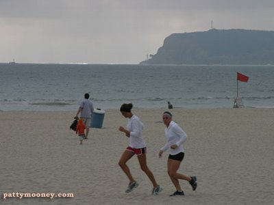 Girls running on Silver Strand Beach Coronado Island