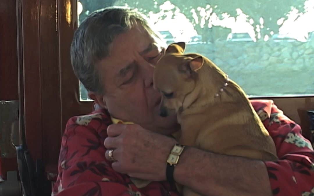 jerry lewis cuddles chihuahua at san diego video production on his boat