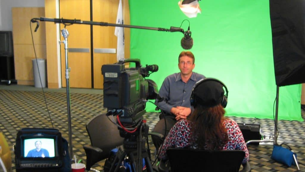 green screen interview celgene office san diego video production producer patty mooney monitor camera boom pole