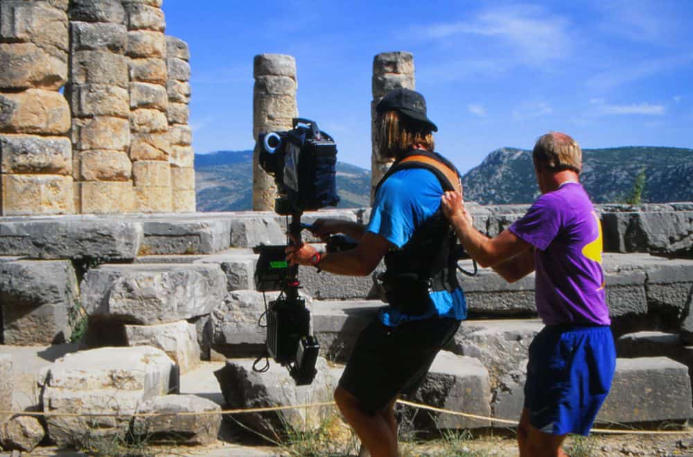 director of photography mark schulze guides steadicam operator dick crow at temple of apollo greece