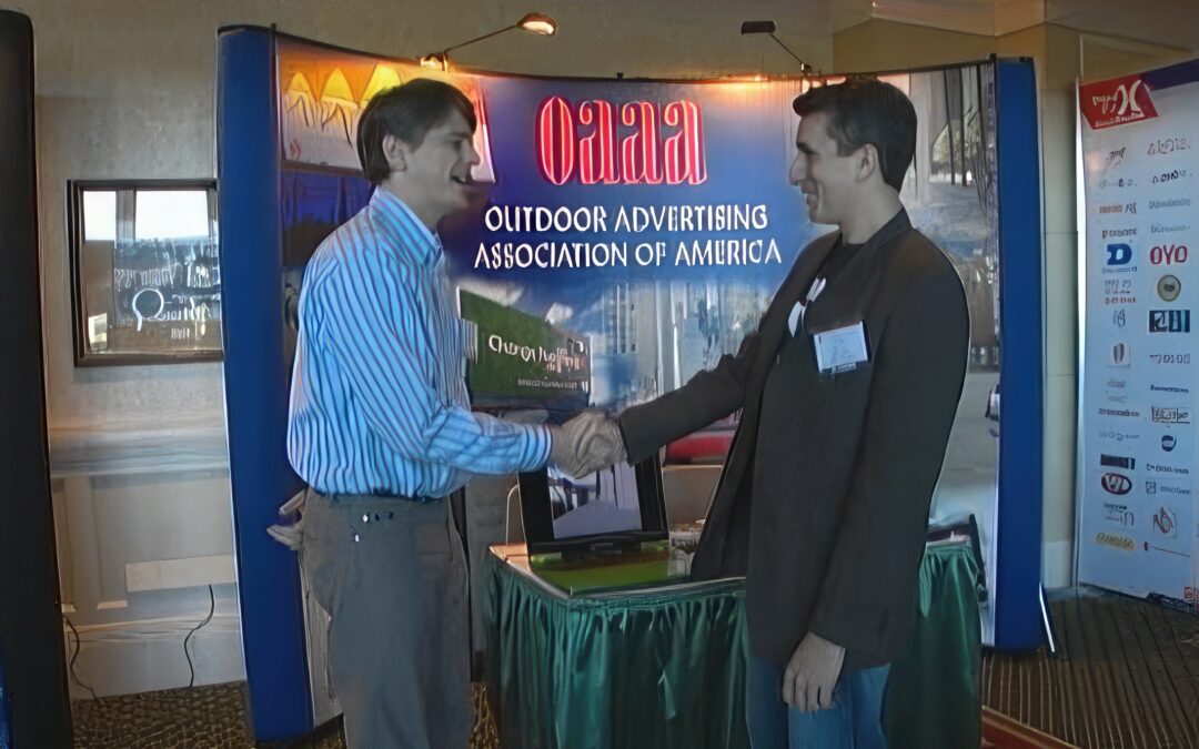 web video for your business two men shake hands oaaa outdoor advertising association of america san diego convention 2007 watts wacker story