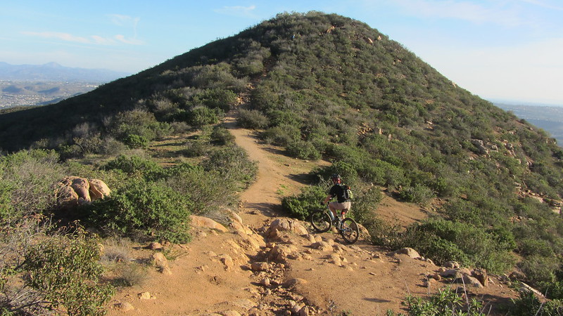 mountain biker climbing North Fortuna mountain in Mission Trails Regional Park San Diego California Photo by Patty Mooney
