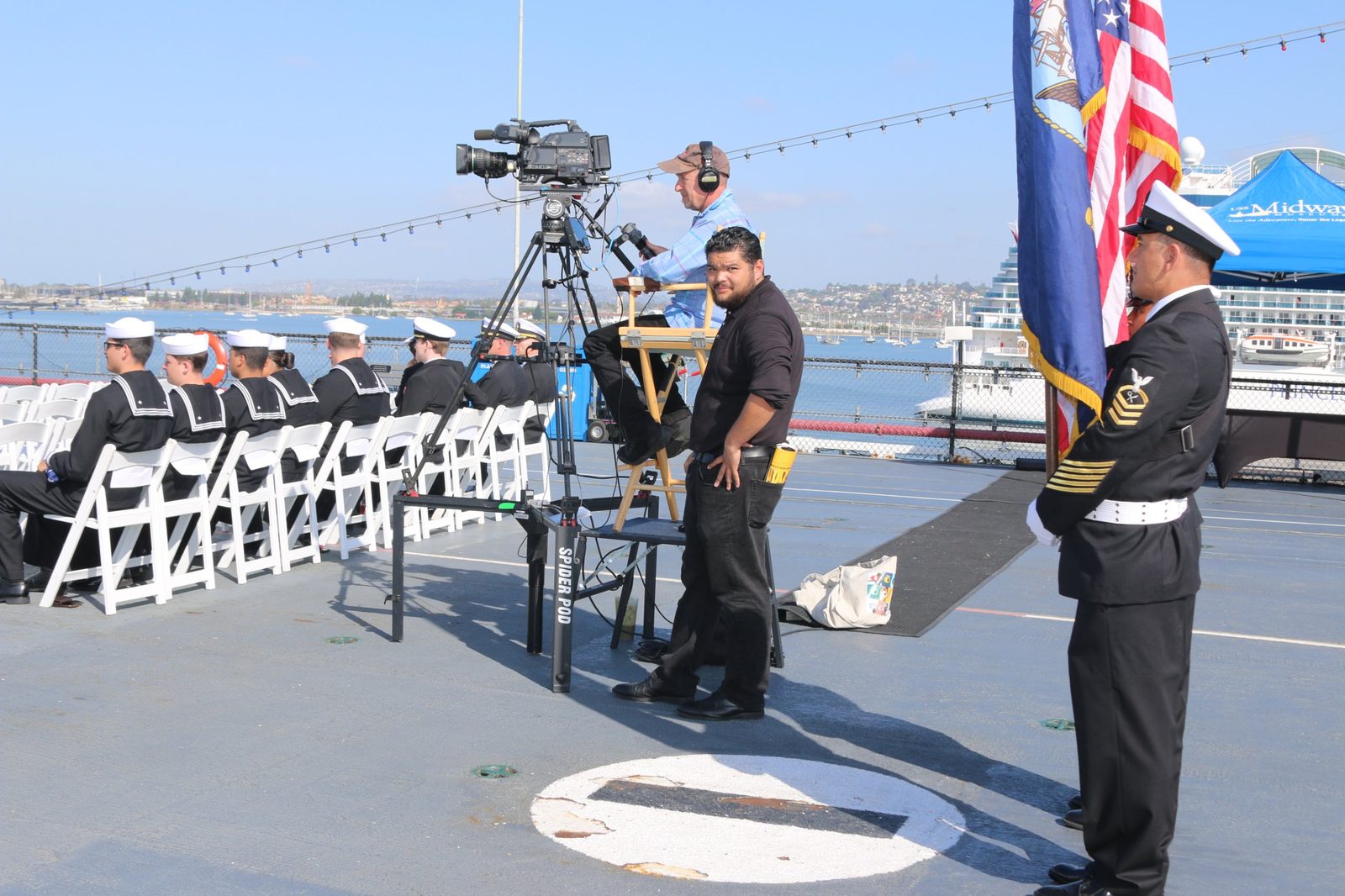 Crystal Pyramid Productions camera crew on deck covering a U.S. Navy change-of-command ceremony on San Diego Bay