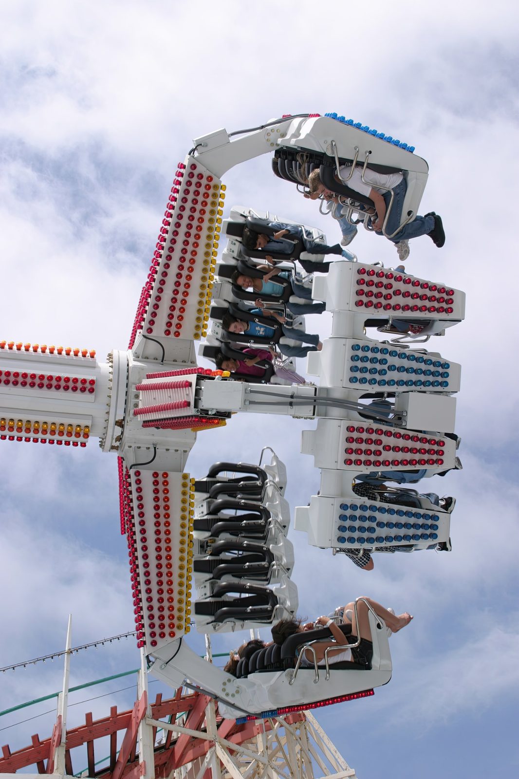 Riders upside down on the Revolution ride at Belmont Park, Mission Beach